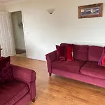 Fantastic Spacious House With Beautiful Panoramic Views Of The Bay Only A Few Minutes Walk From Beach Harbour And Restaurants This House Has 3 Bedrooms 3 Bathrooms And 2 Lovely Sitting Rooms