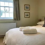 Reduced Rates For This Month! Beautiful Cottage, 3 Stories High With Upstairs Courtyard And Set In An Amazing Location! The Fantastic Newly Developed Town Mill With Restaurants And Craft Shops On Your Doorstep Also Only 2 Minutes To The Sea! , Sleeps